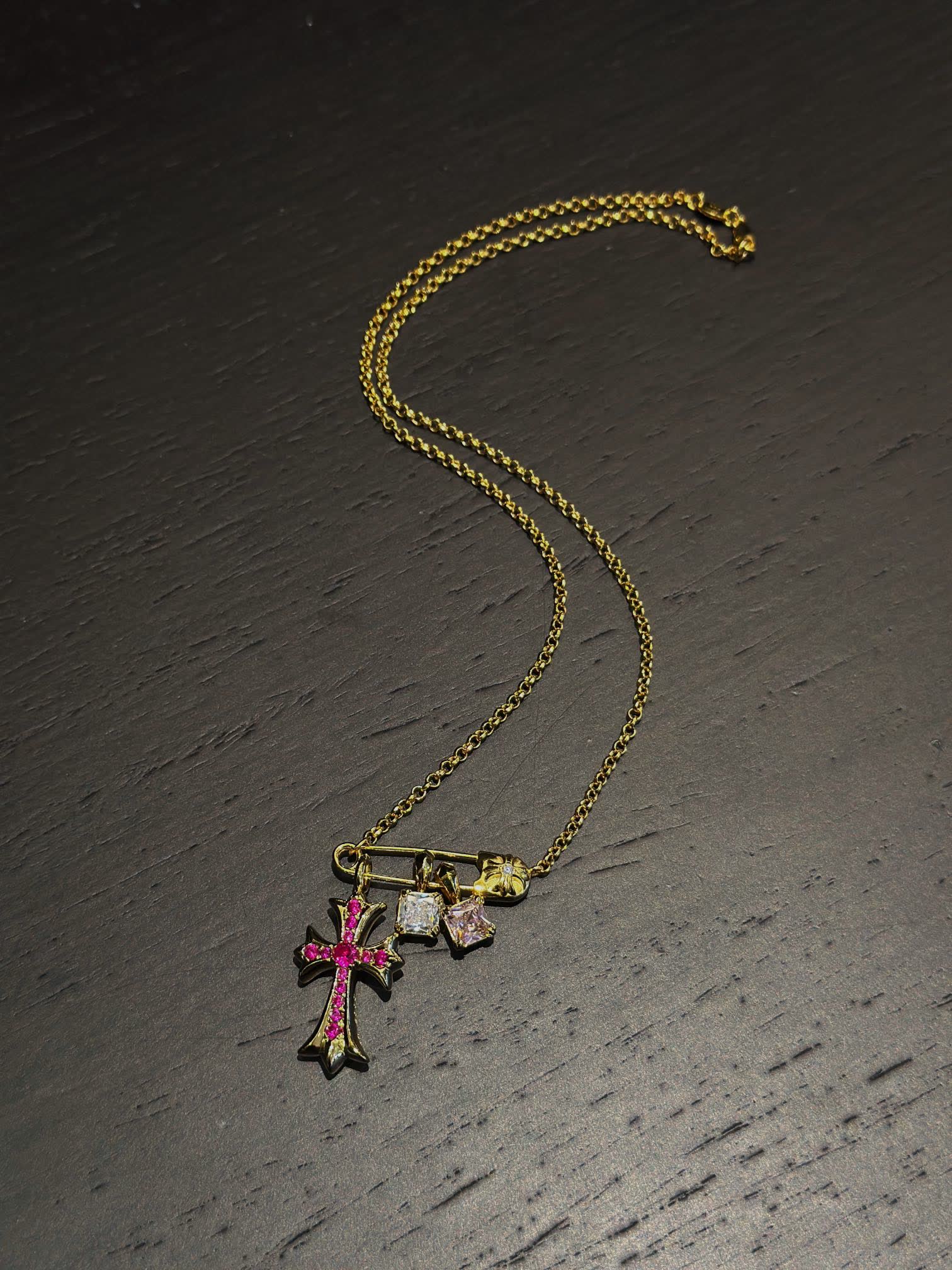 Chrome Hearts Gold Cross Pendant with Gemstones